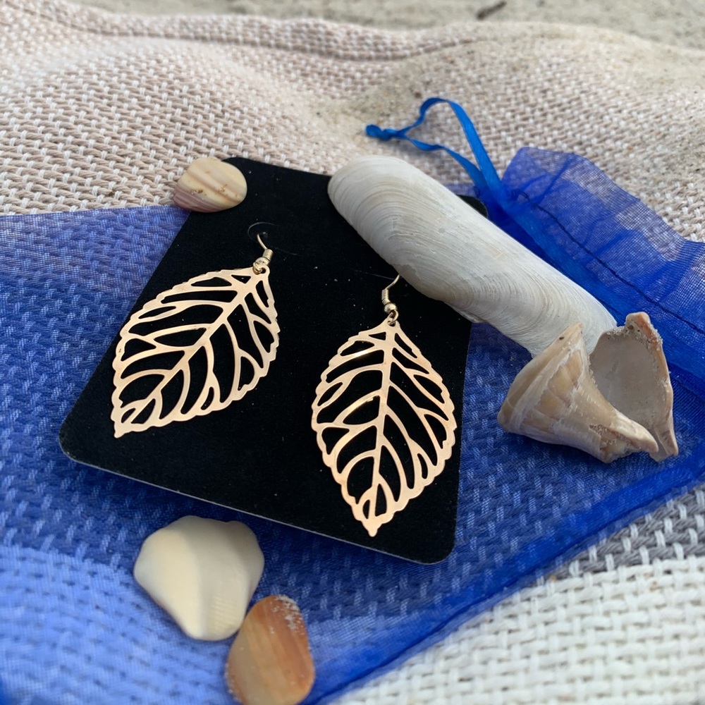 Gold tone open work leaf pierced earrings